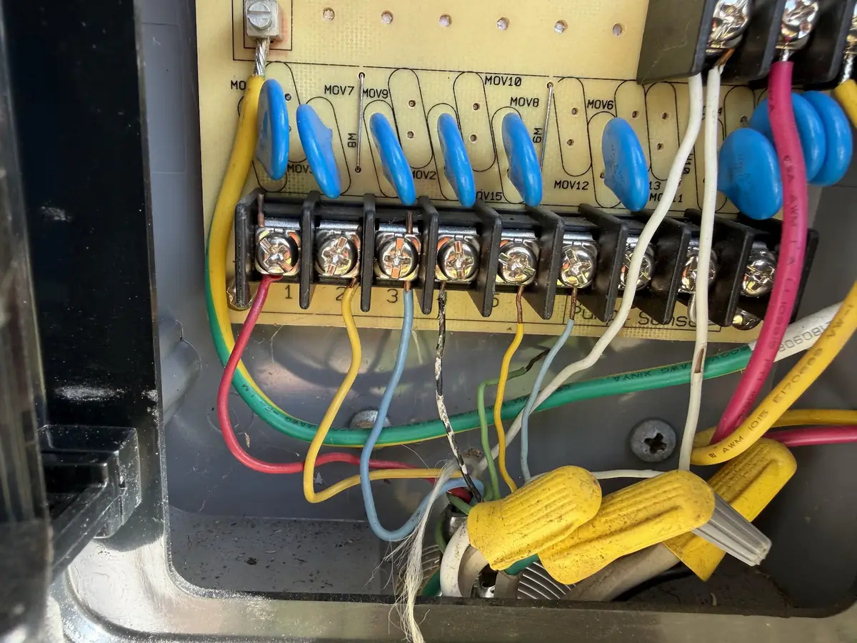 Sprinkler controller terminal board with wiring being troubleshot