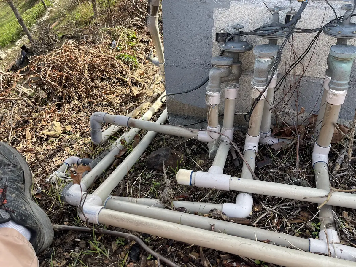 Sprinkler valves and pipe damaged by wildfire at a Malibu home