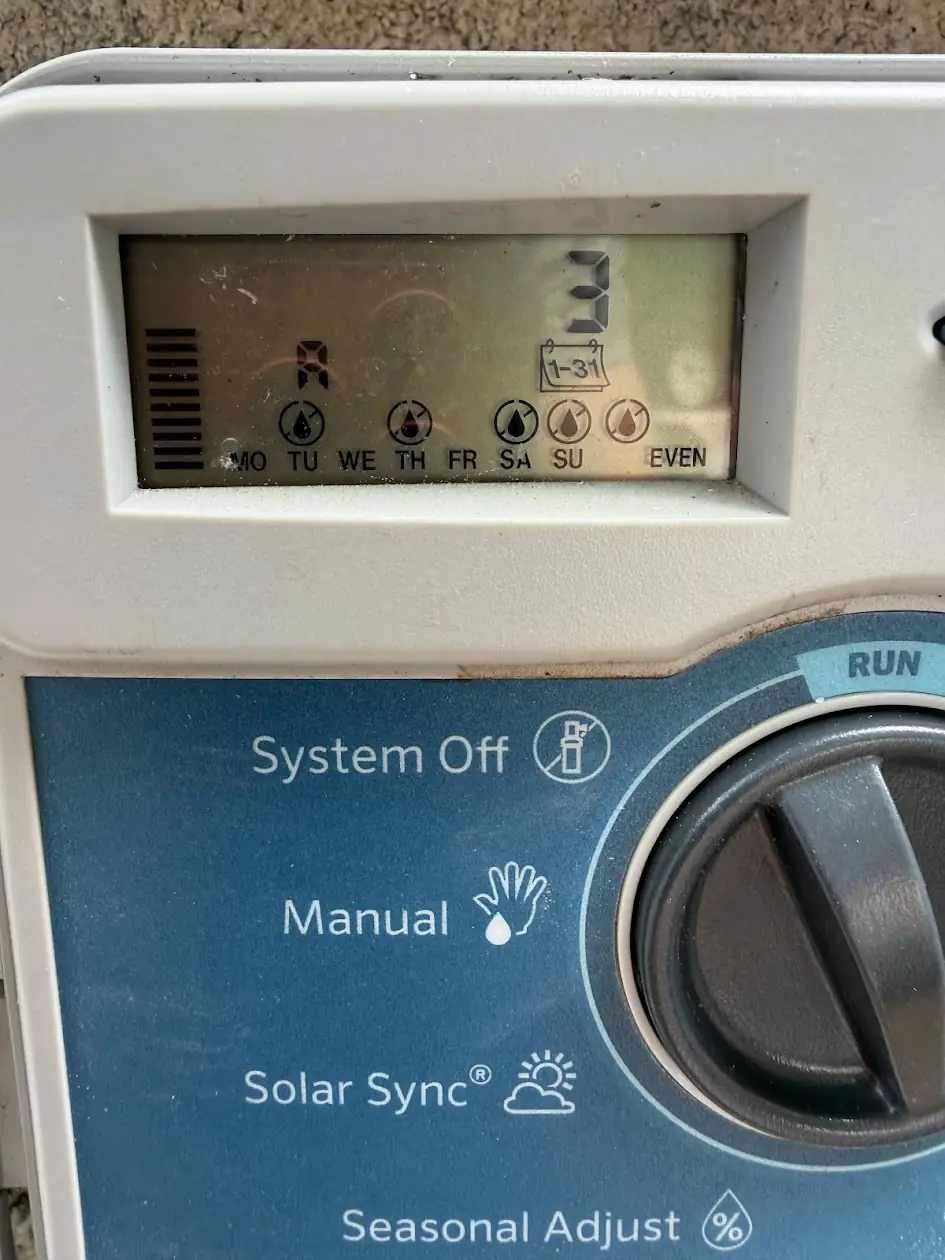 Hunter sprinkler timer display showing the watering-day settings
