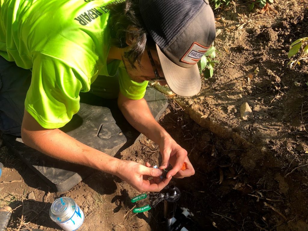 Working on Sprinkler Pipes